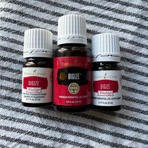 Young Living DiGize Essential Oil 15ml bottle and 2 5ml bottles new not opened